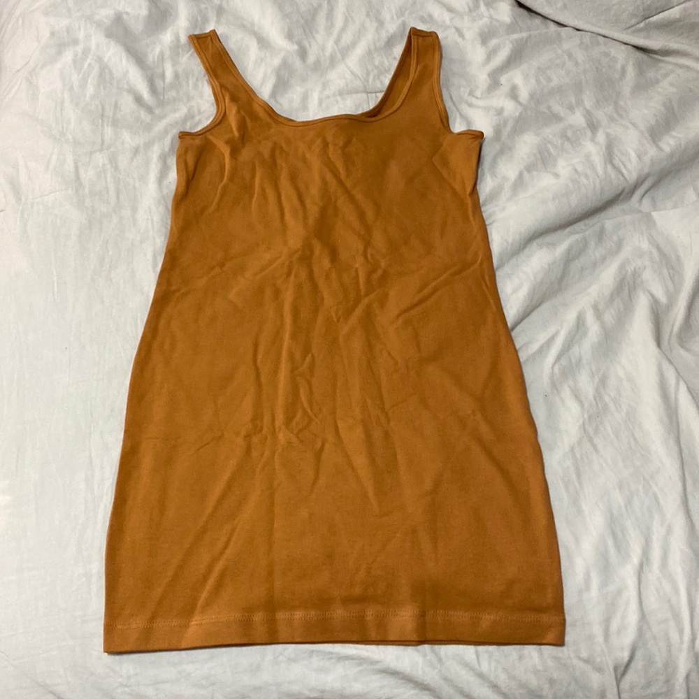Brown bodycon dress. Size small. Brand is forever 21. Brand new never worn